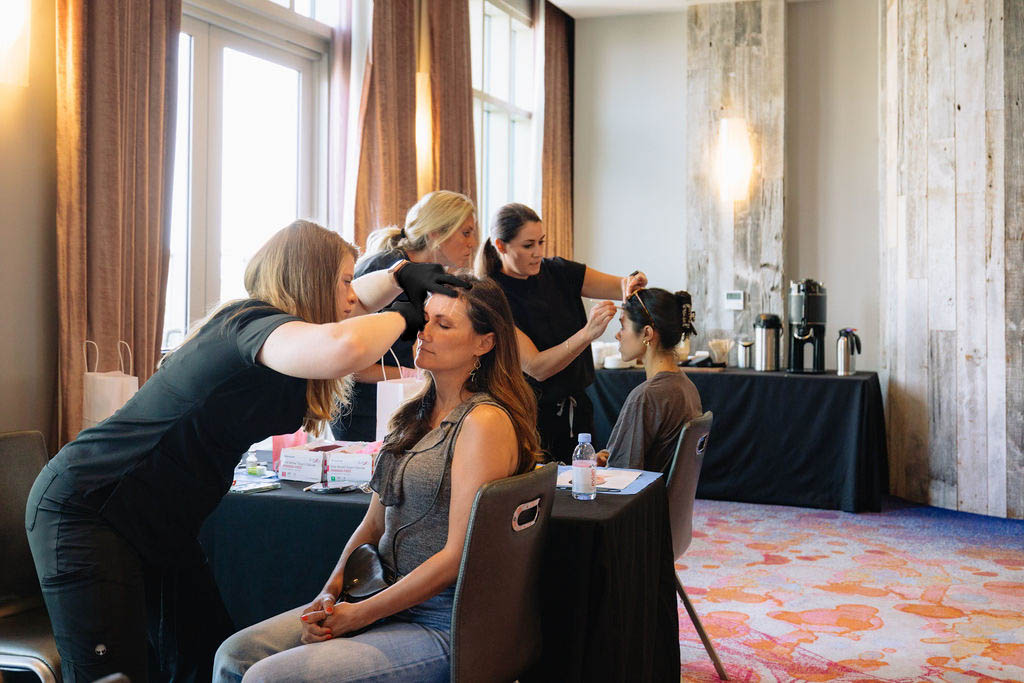Provider administering Botox injection to a patient during a Skin Clique training session.